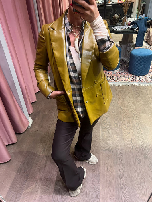 PANTALONE MODELLO FLARE TENSIONE IN